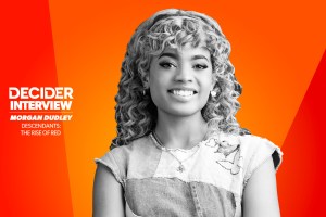 Morgan Dudley in black and white on a bright orange background