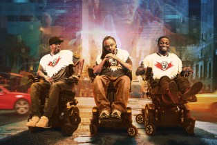 Three men in wheelchairs in Quad Gods