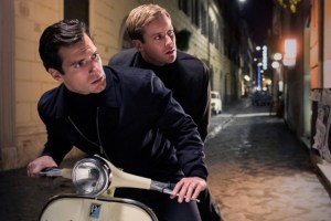 Two men on a vespa at night in The Man From U.N.C.L.E